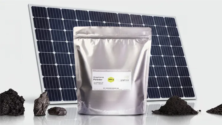 A bag of graphene powder in front of a solar panel