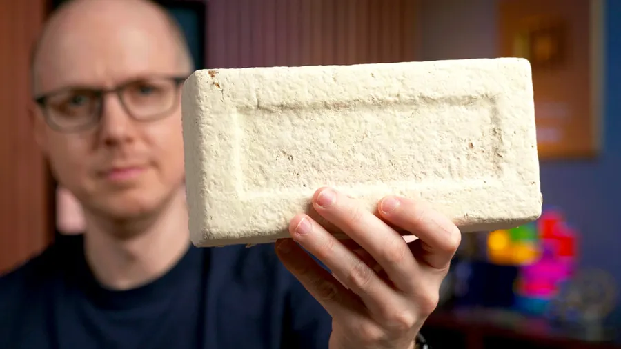 Matt Ferrell holding a MycoComposite block
